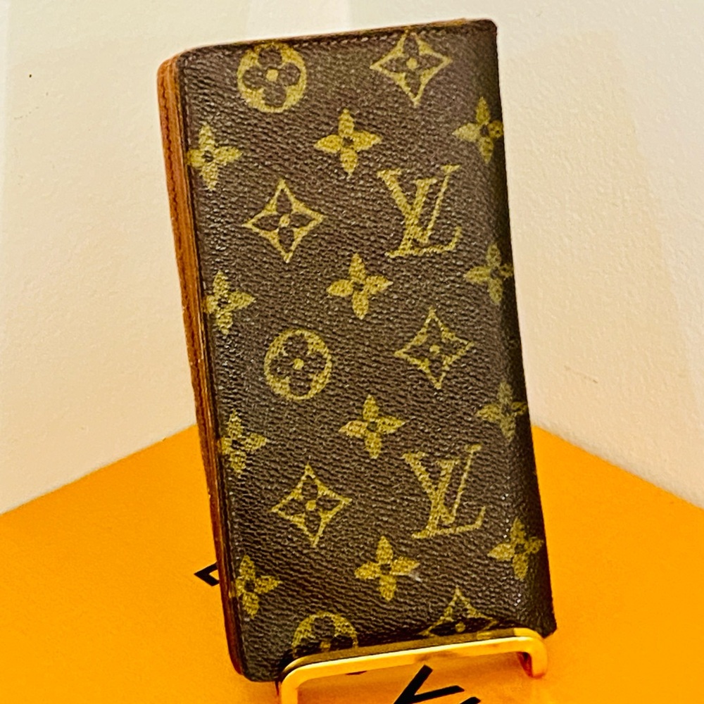 Louis Vuitton Monogram clutch Wallet bifold